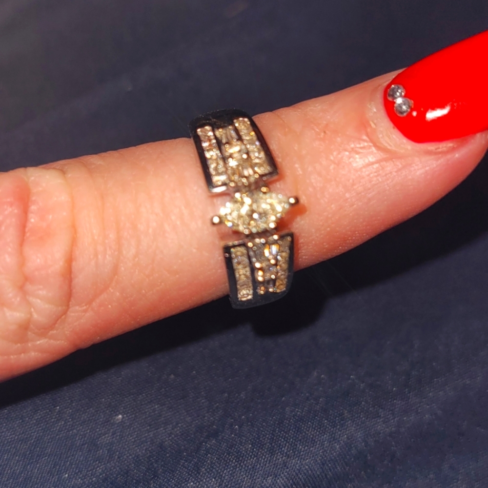 14k channel set Diamond engagement ring.